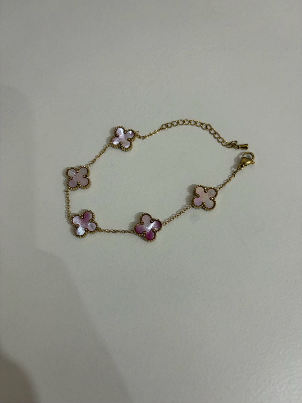 Gold Tone Chain Bracelet with Pink Clover Motifs
